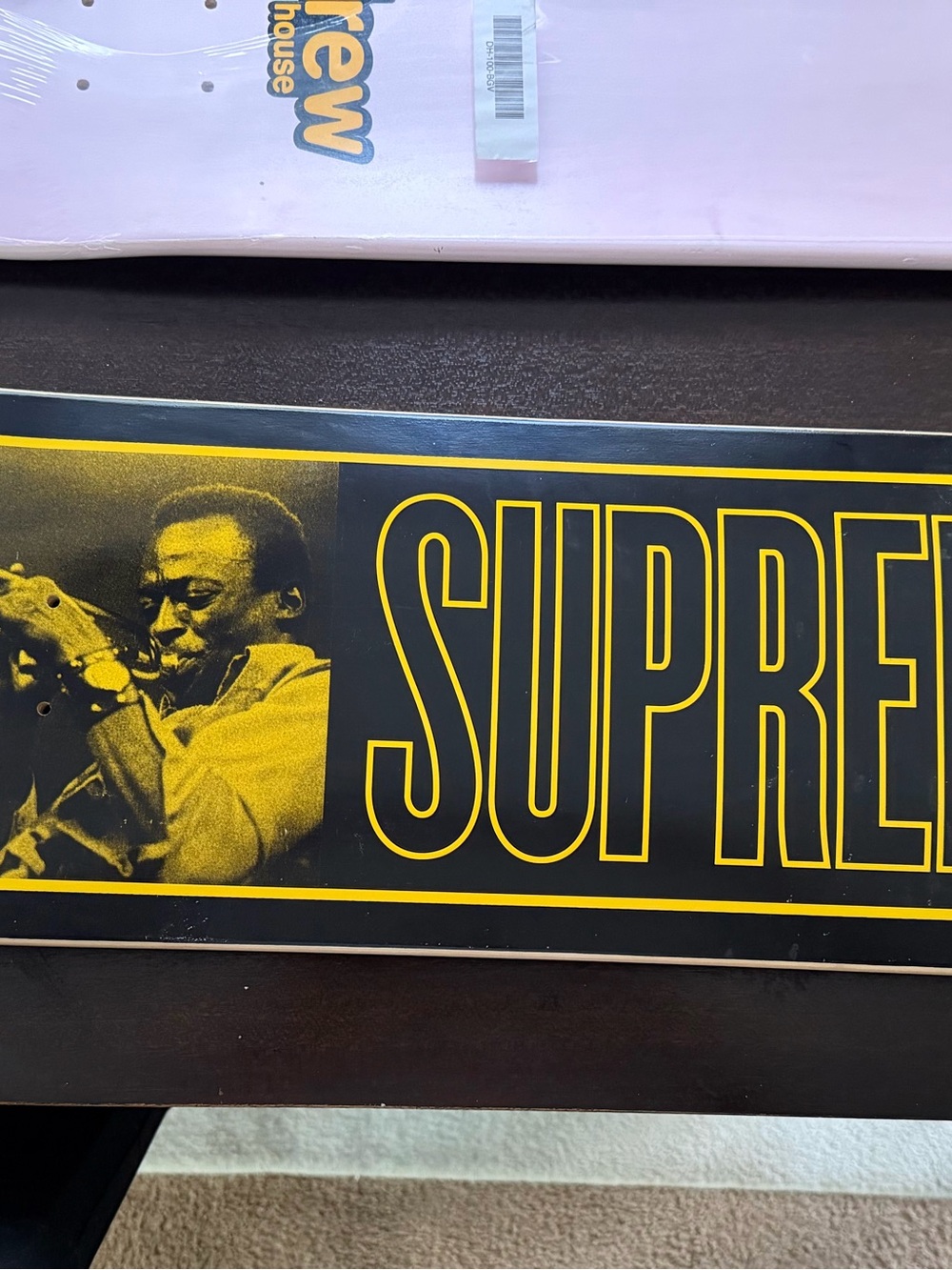 Supreme Black and Yellow Jazz Graphic Skate Deck
